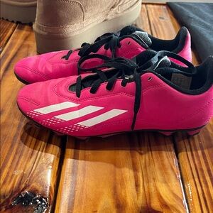 Pink adidas cleats